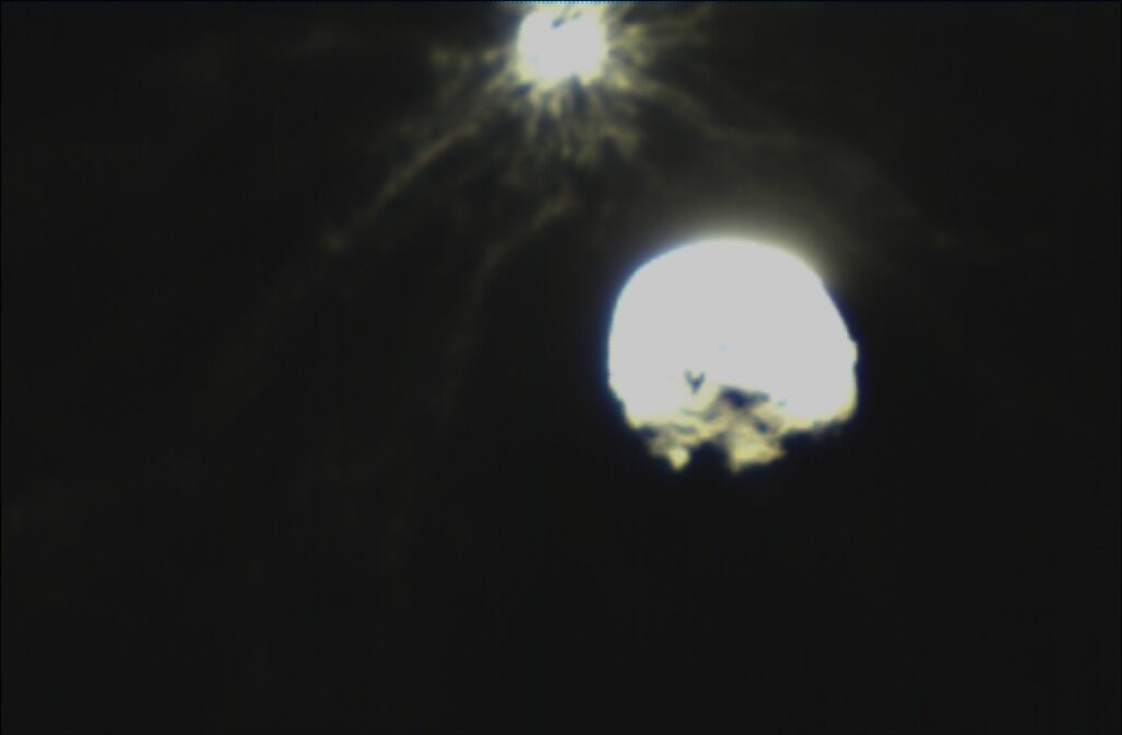 Bright plume of debris streaming from Dimorphos after the DART impact, seen by the LICIACube cubesat